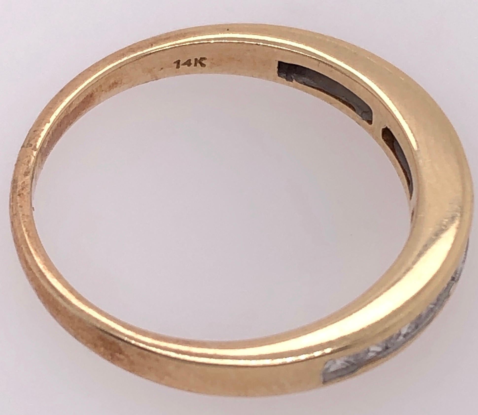 14 Karat Yellow Gold Band / Wedding Ring with Diamonds 0.45 Total Diamond Weight.
Size 7 
3 grams total weight.
