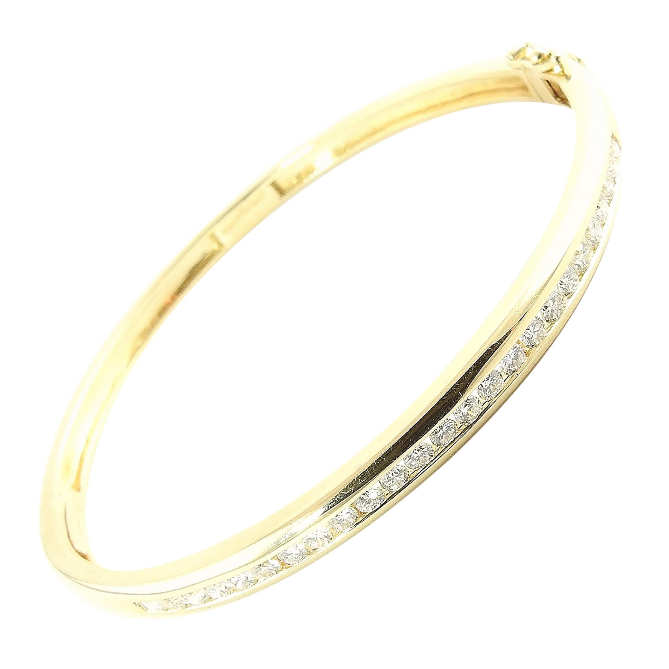 14 Karat Yellow Gold and Diamond Bangle Bracelet