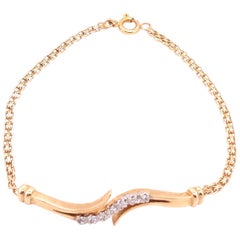 Bracciale in oro giallo 14 carati e diamanti 0,14 TDW