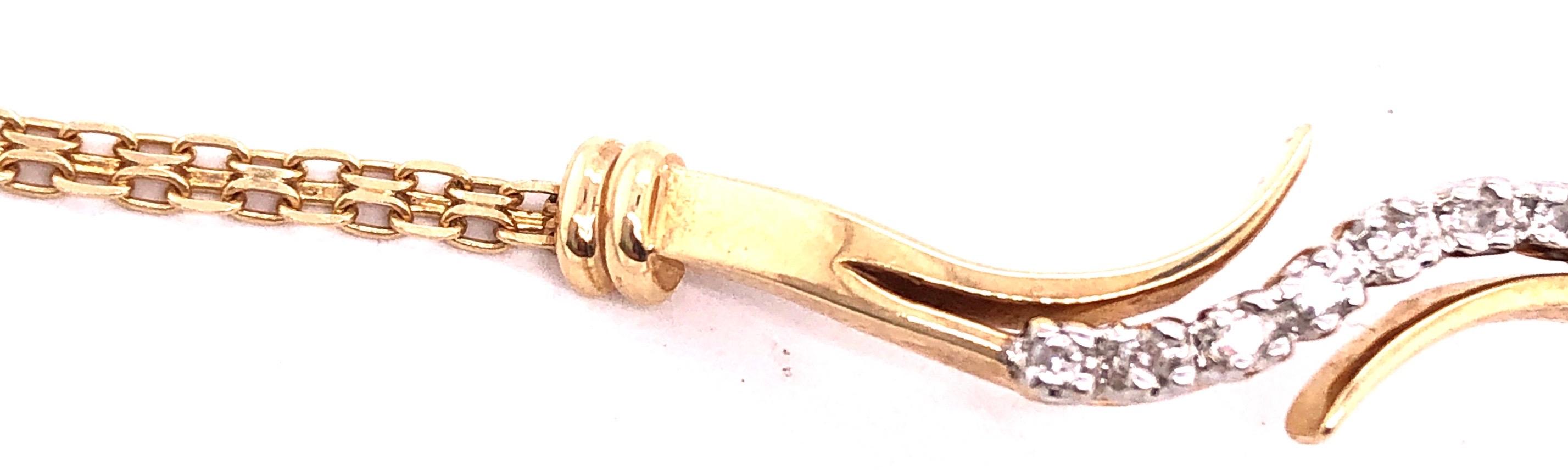 14 Karat Yellow Gold 7 inch Fancy Link Bracelet with Diamonds 0.14 TDW.
4 grams total weight.