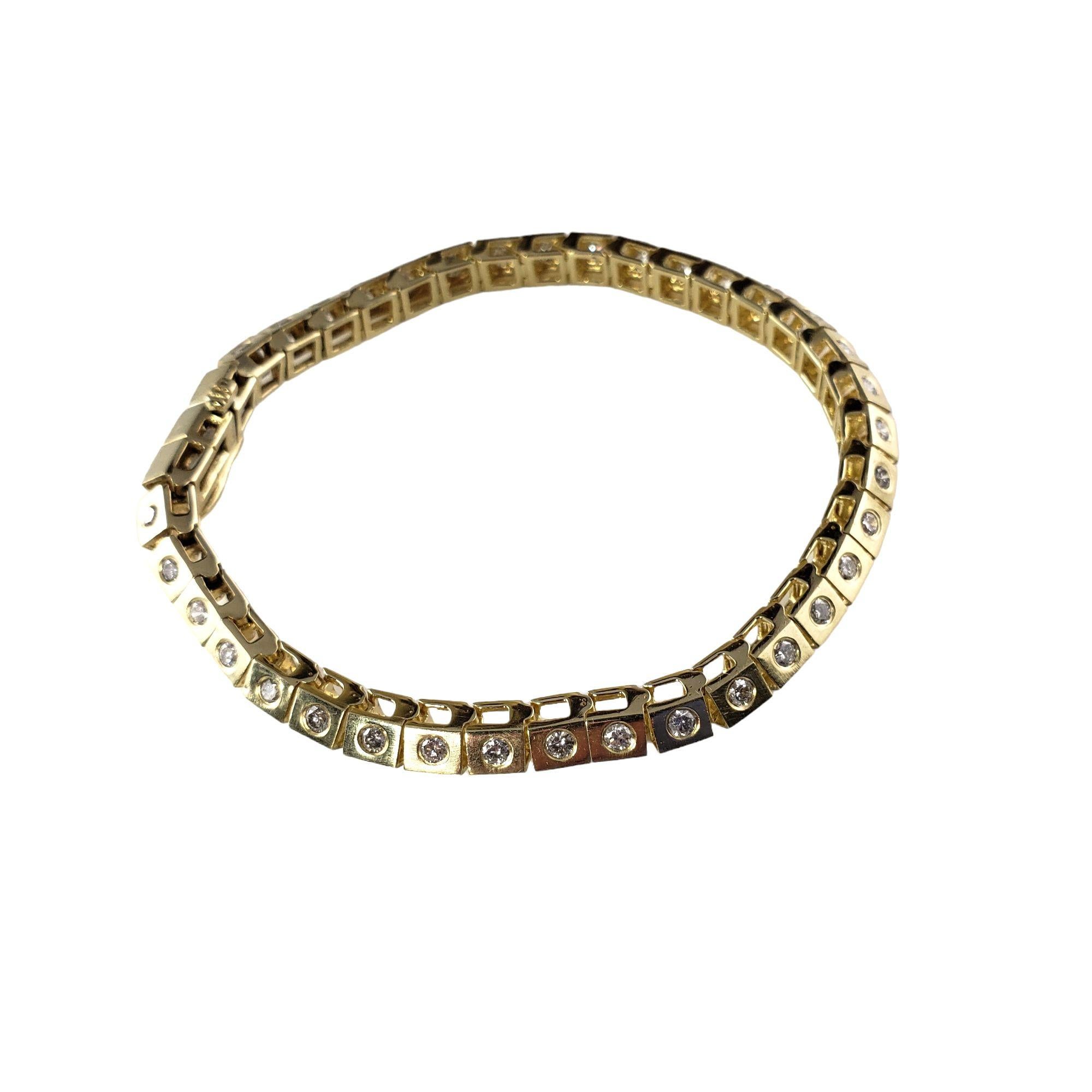 Vintage 14 Karat Yellow Gold and Diamond Bracelet-

This sparkling bracelet features 70 round brilliant cut diamonds set in classic 14K yellow gold. Width: 5 mm.

Approximate total diamond weight: 2.10 ct.

Diamond color: I

Diamond clarity: