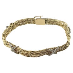 Pulsera de Oro Amarillo de 14 Kilates y Diamantes