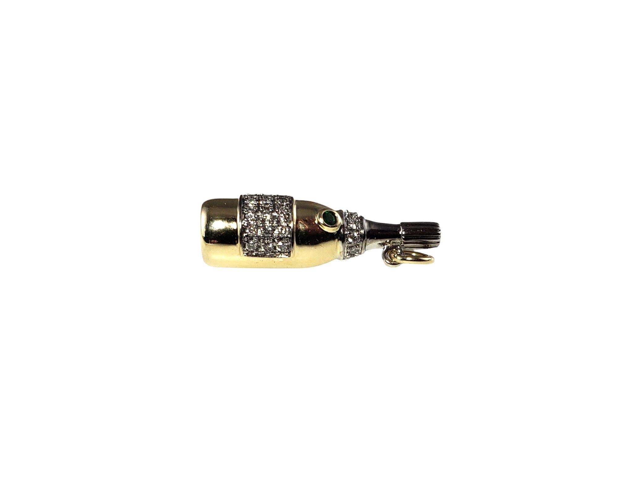 Vintage 14 Karat Yellow Gold and Diamond Champagne Bottle Charm-

Time to celebrate!

This lovely 3D champagne bottle charm features 24 round brilliant cut diamonds and one green gemstone set in beautifully detailed 14K yellow gold.

Approximate