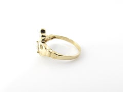 14 Karat Yellow Gold and Diamond Claddagh Ring