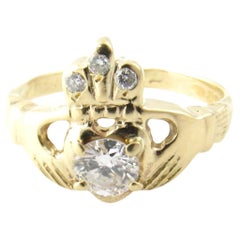 14 Karat Yellow Gold and Diamond Claddagh Ring