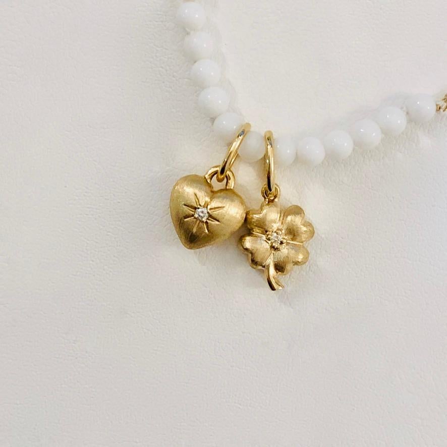14k Yellow Gold Brushed Gold Clover Charm with Diamond Accent (available with polish finish and birthstone of choice by special order).  Beautiful on its own and a wonderful addition to a charm necklace or bracelet. 
