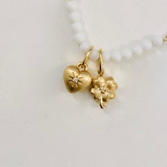 14 Karat Yellow Gold and Diamond Clover Charm Pendant