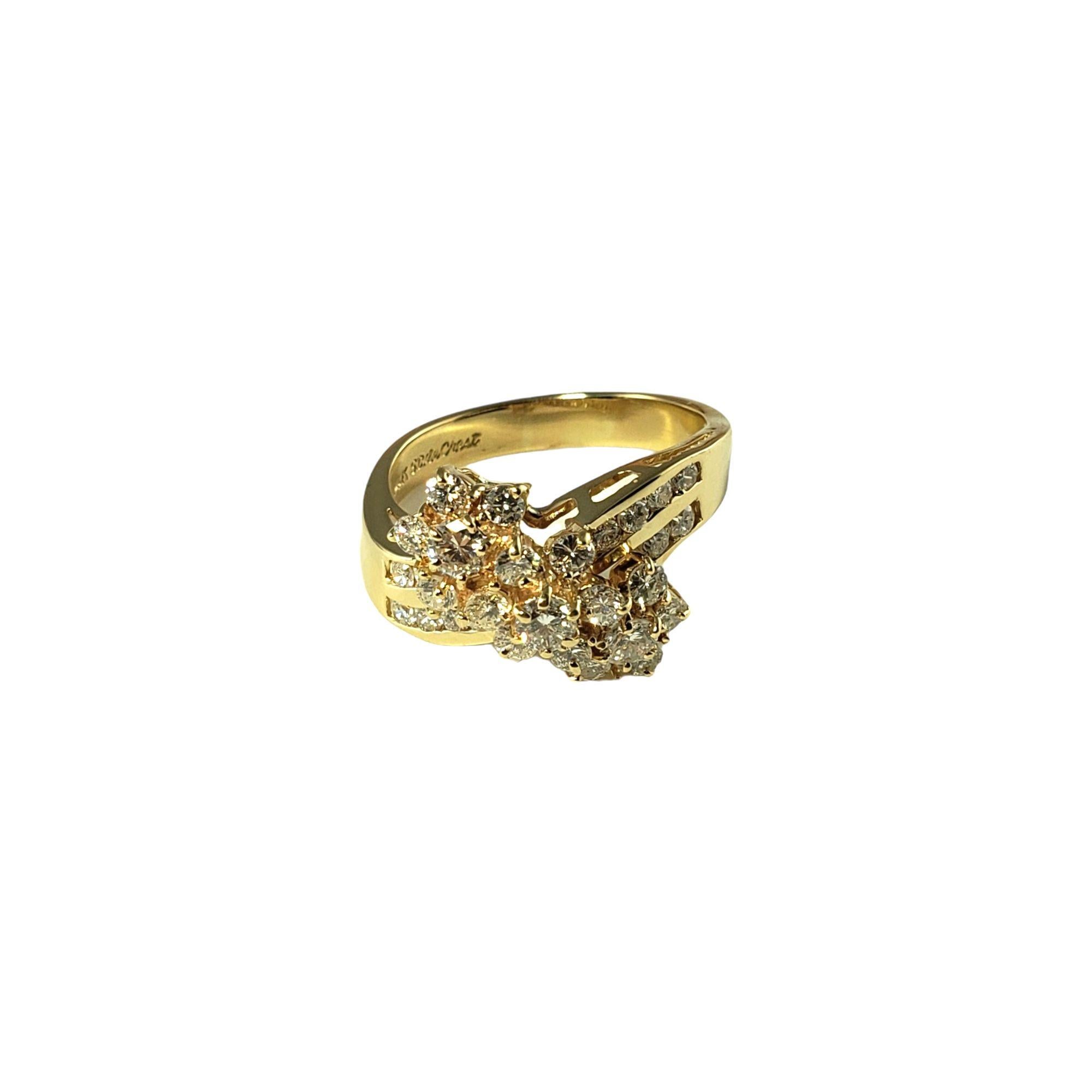 Vintage 14 Karat Yellow Gold Diamond Cluster Ring Size 8.5-

This sparkling ring features 29 round brilliant cut diamonds set in beautifully detailed 14K yellow gold. Width: 17 mm. Shank: 3 mm.

Total diamond weight: 1.24 ct.

Diamond color: