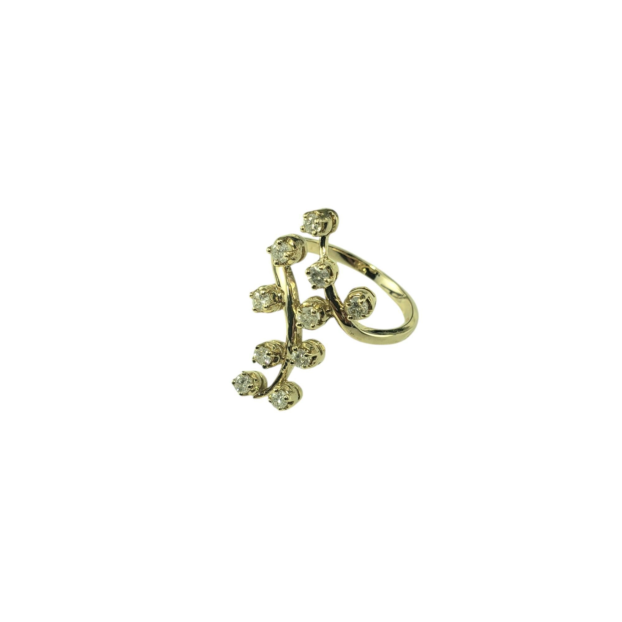 14 Karat Yellow Gold and Diamond Cocktail Ring Size 7.5

This 14K yellow gold ring is set with 10 sparkling round brilliant cut diamonds, the perfect balance of glamour and classic elegance. Top of ring measure 24 mm x 14 mm.
Shank: 2
