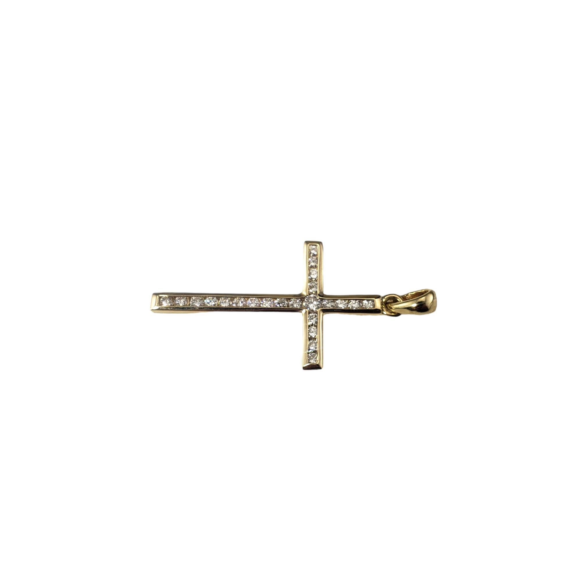 14 Karat Yellow Gold and Diamond Cross Pendant

This sparkling cross pendant features 23 round brilliant cut diamonds* set in classic 14K yellow gold.
*Chip noted to one stone not visible to naked eye.

Approximate total diamond weight:  .50