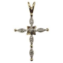 14 Karat Yellow Gold and Diamond Cross Pendant