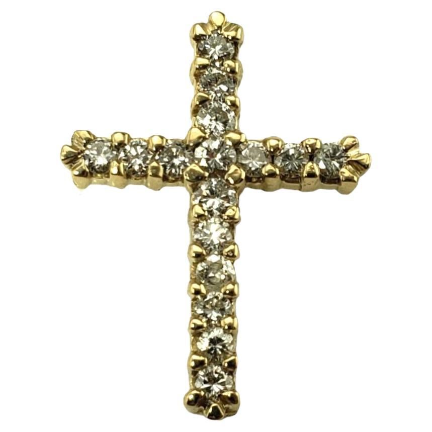 14 Karat Yellow Gold and Diamond Cross Pendant