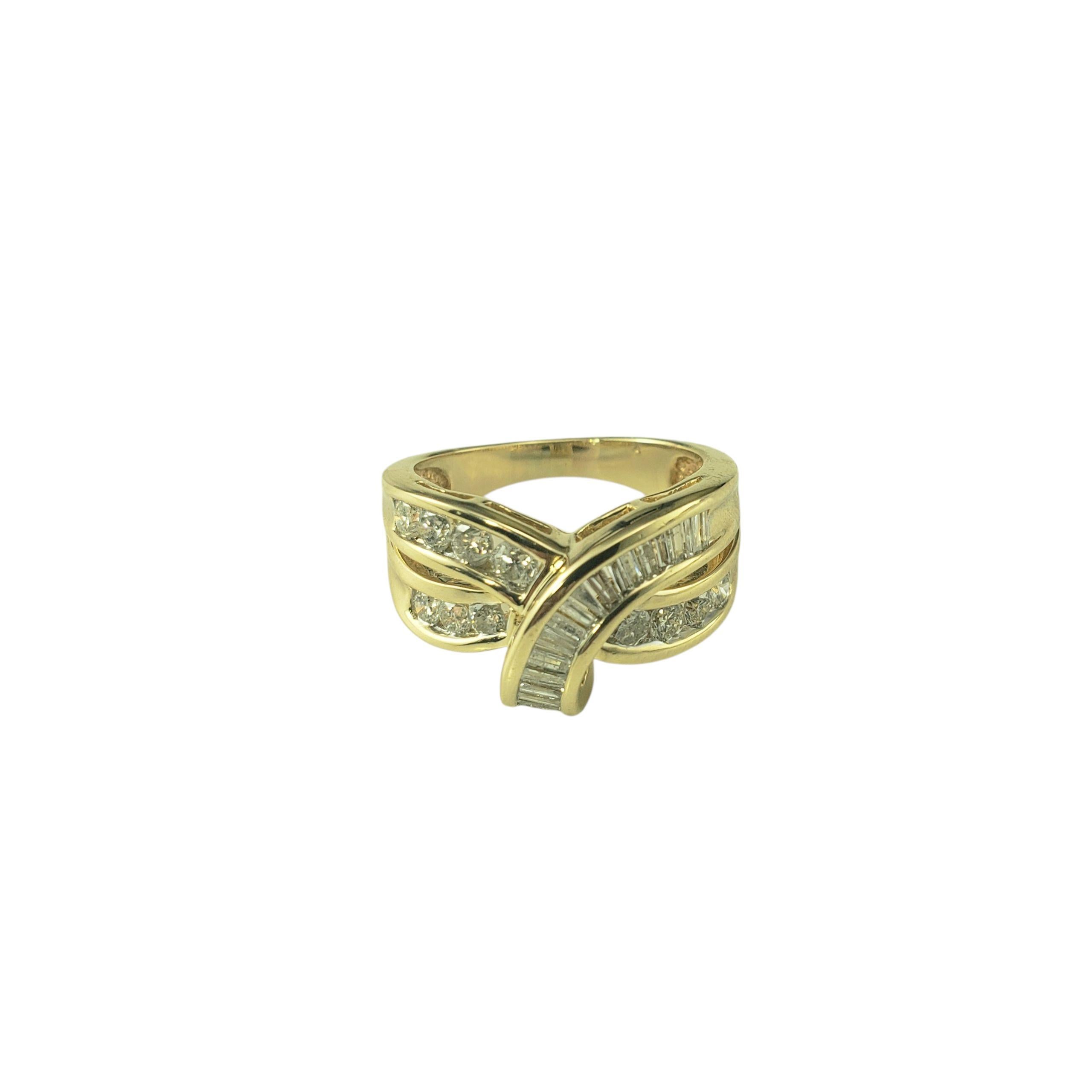 14K Yellow Gold and Diamond Crossover Ring Size 7-

This sparkling 14K yellow gold ring features a harmonious blend of 18 baguette diamonds and 11 round brilliant cut diamonds set in a timeless crossover design.

Approximate total diamond weight: