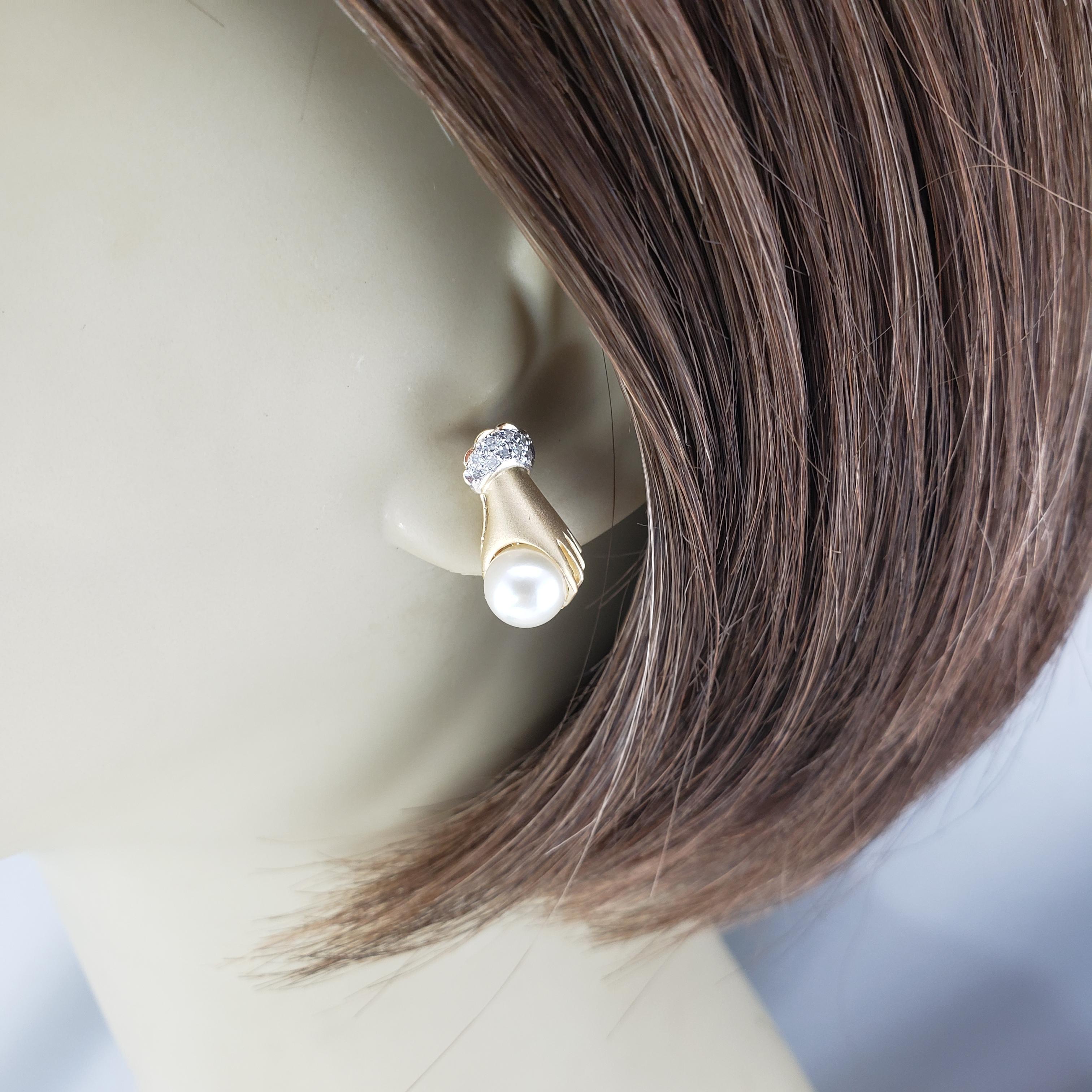 14 Karat Yellow Gold and Diamond Cuffed Hand Holding Pearl Stud Earrings #19527 For Sale 2