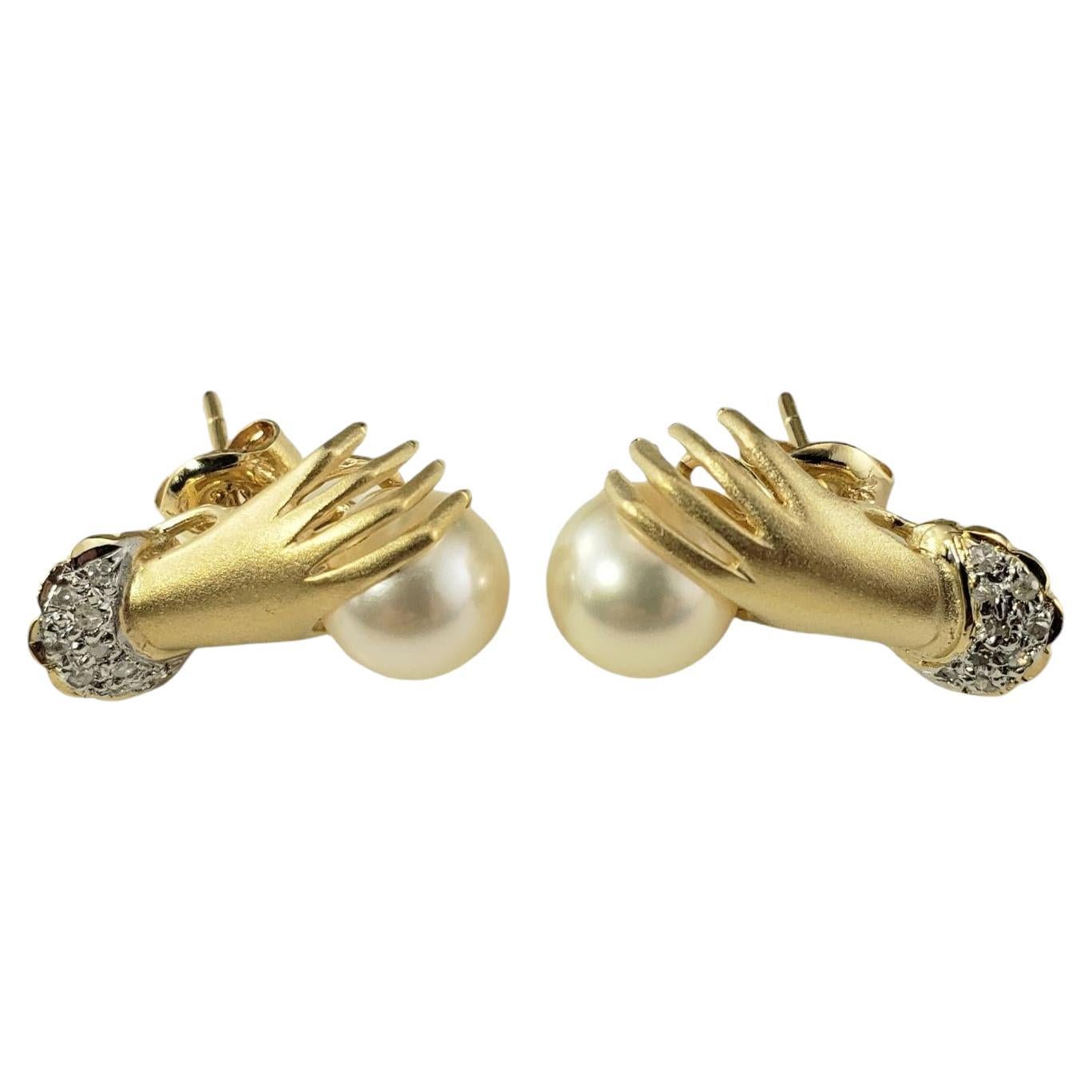 14 Karat Yellow Gold and Diamond Cuffed Hand Holding Pearl Stud Earrings #19527 For Sale