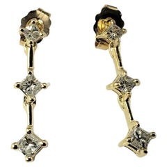 14 Karat Yellow Gold and Diamond Dangle Earrings #17423