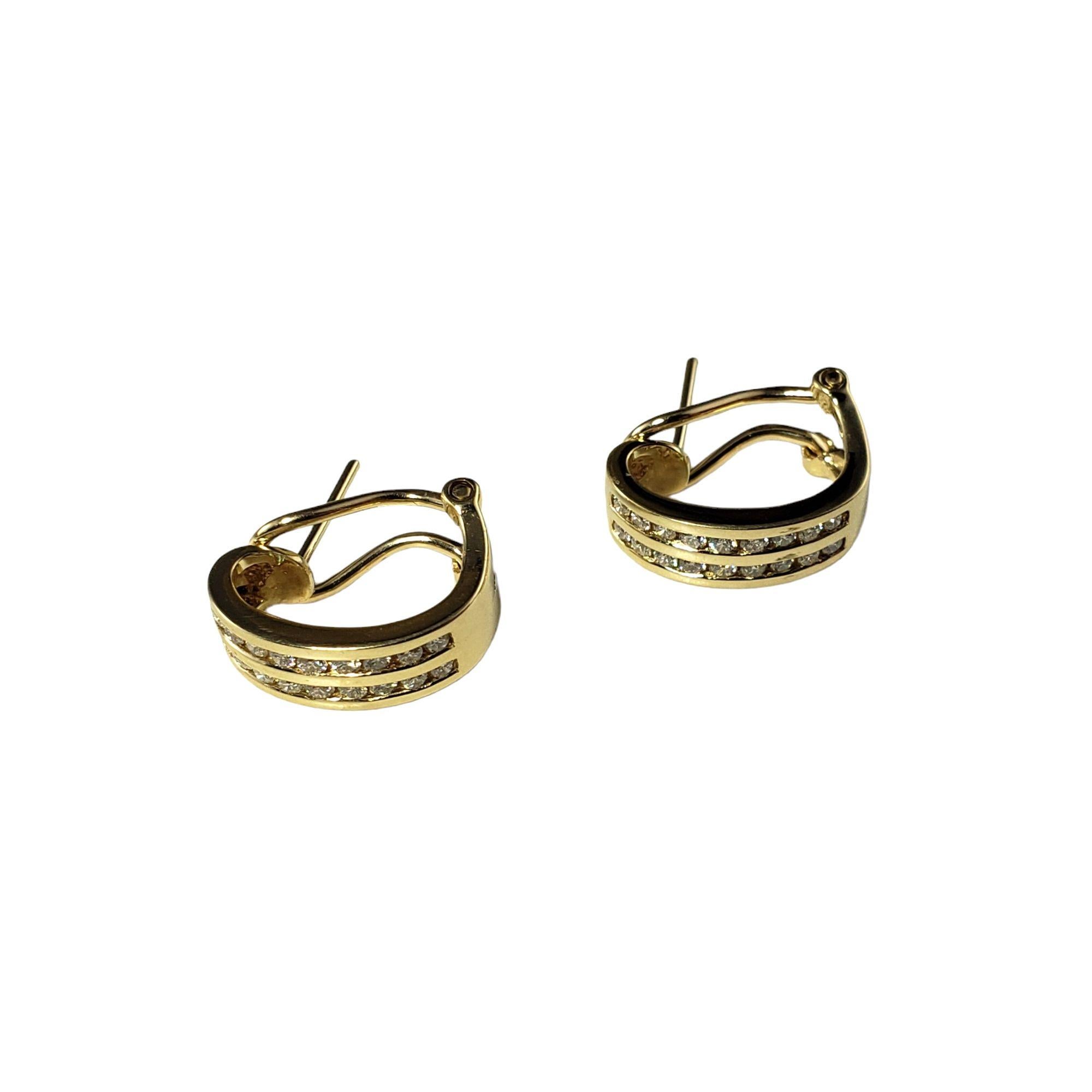 Round Cut 14 Karat Yellow Gold and Diamond Earrings For Sale