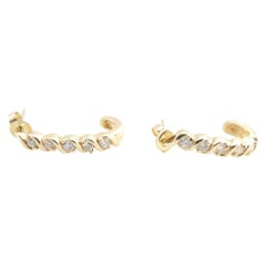 14 Karat Yellow Gold and Diamond Earrings