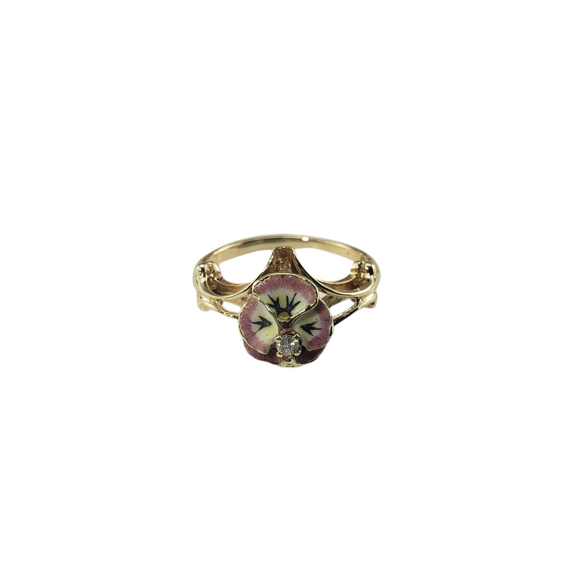 14 Karat Yellow Gold and Diamond Enamel Floral Ring Size 5.75-

This stunning ring features a lovely orchid accented with pink enamel and one round brilliant cut diamond.  Set in classic 14K yellow gold.  Width:  12 mm.
Shank: 1.5 mm.

Approximate