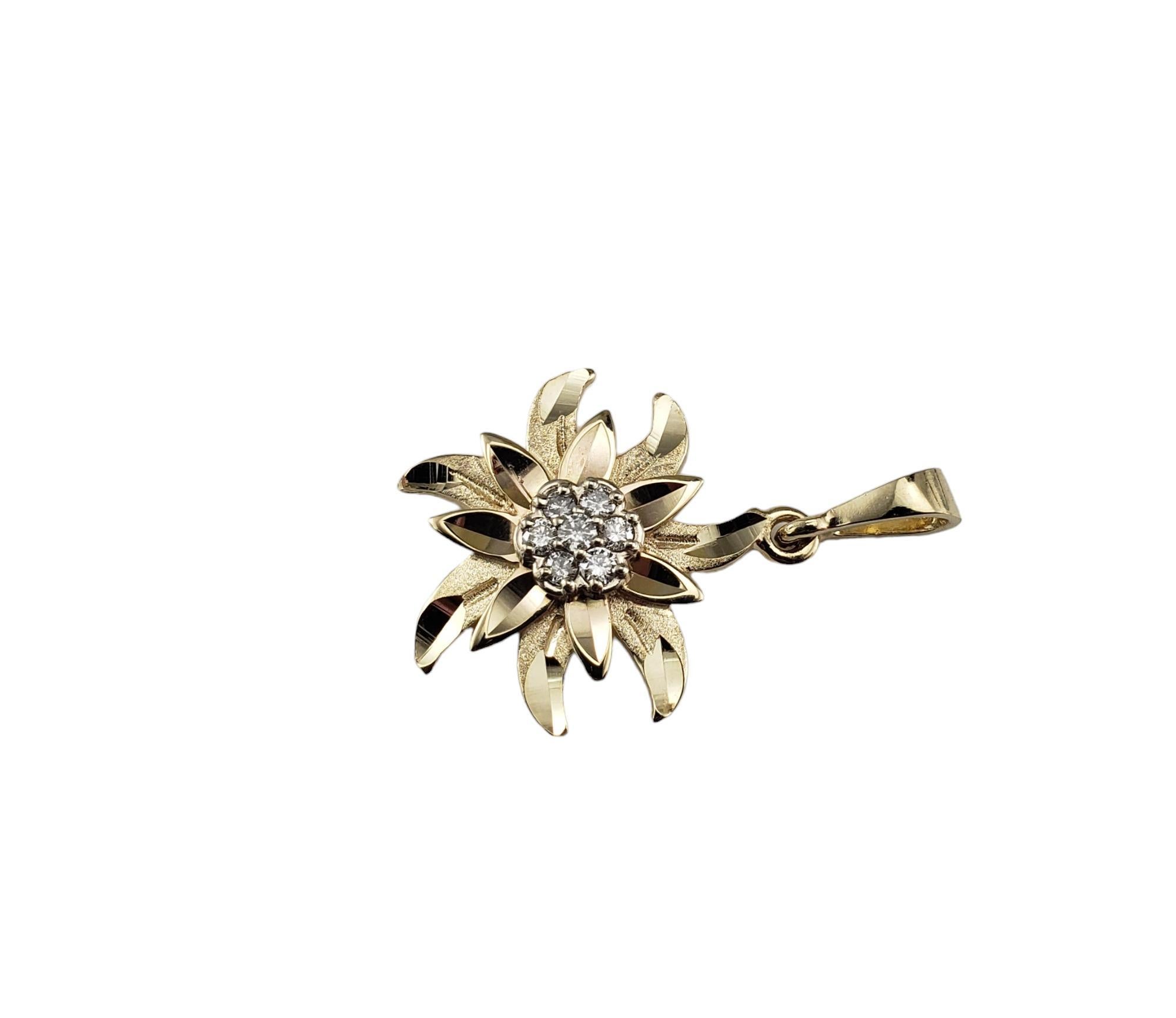14 Karat Yellow Gold and Diamond Flower Pendant

This stunning flower pendant features seven round brilliant cut diamonds set in beautifully detailed 14K yellow gold.

Approximate total diamond weight: .14 ct.

Diamond color: G-H

Diamond clarity: