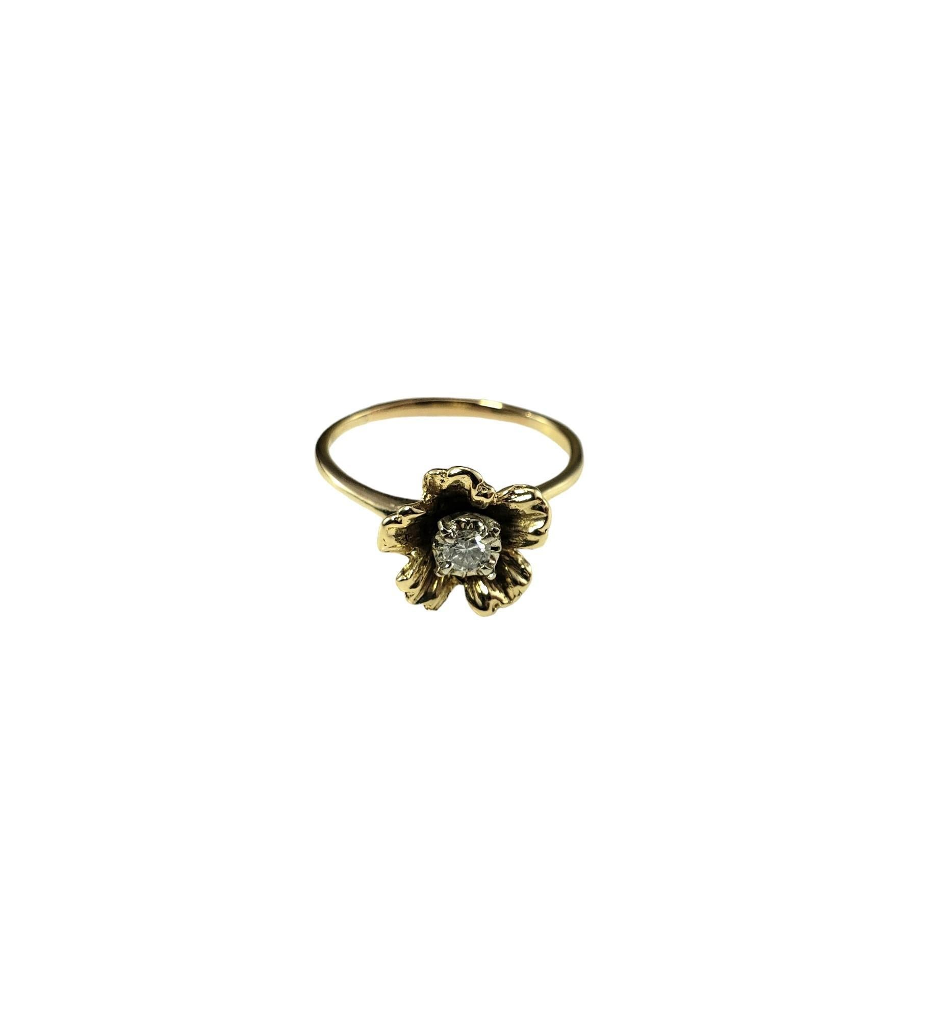 14 Karat Yellow Gold and Diamond Flower Ring Size 8

This lovely 14K yellow gold ring features one round brilliant cut diamond set in a beautifully detailed floral design.  

Width: 11 mm.  

Shank: 1 mm.

Approximate total diamond weight: 0.10