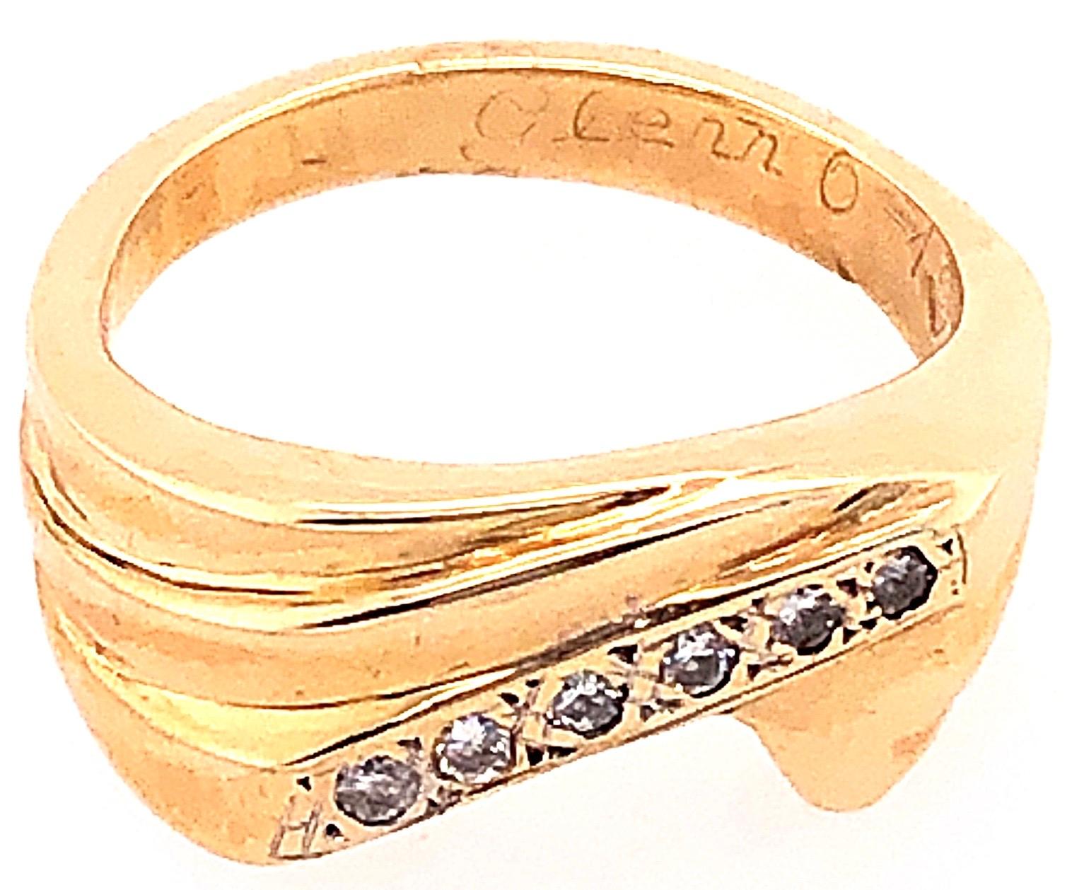 14 Karat Yellow Gold And Diamond Free Form Ring Size 6.25.
0.30 total diamond weight.
7.76 grams total weight.