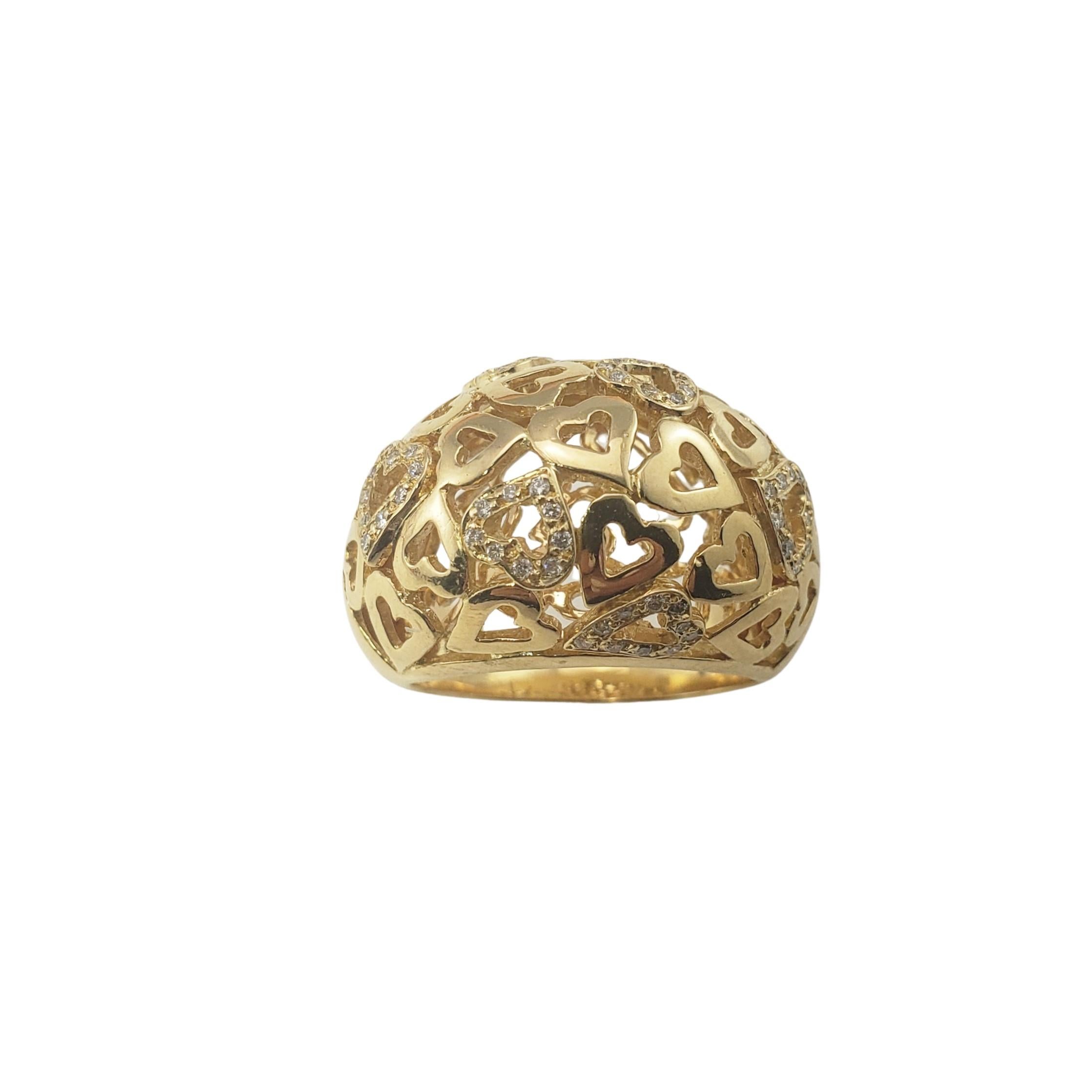 14 Karat Yellow Gold and Diamond Heart Dome Ring Size 7.25-

This lovely ring features 57 round brilliant cut diamonds set in a stunning heart design.  Width:  16 mm.  Shank:  4 mm.
Height:  10 mm.

Approximate total diamond weight:   .28