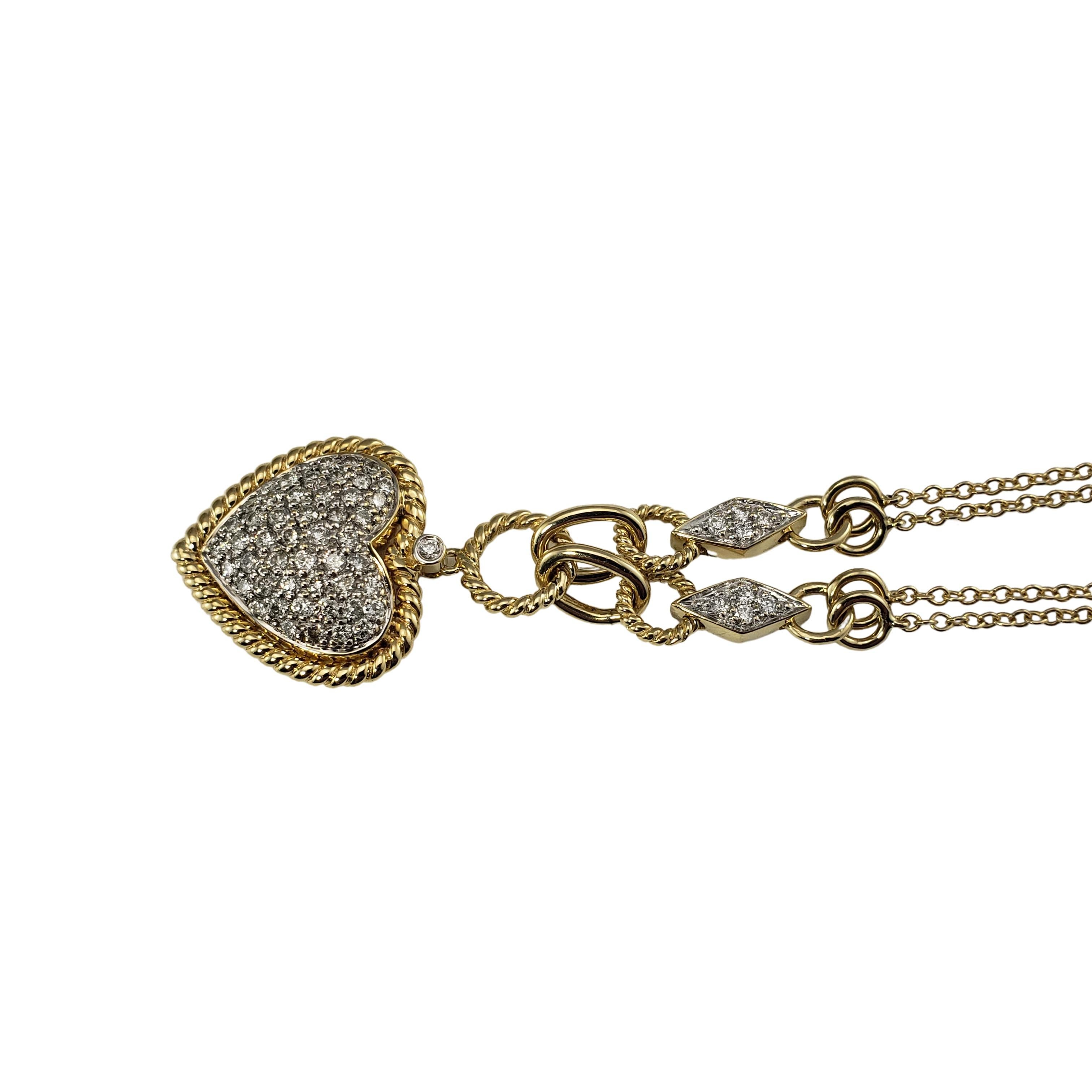 14 Karat Yellow Gold and Diamond Heart Pendant Necklace-

This stunning heart pendant features 50 round brilliant cut diamonds set in 14K yellow gold.  The double cable chain is accented with eight round brilliant cut diamonds.  

Approximate total