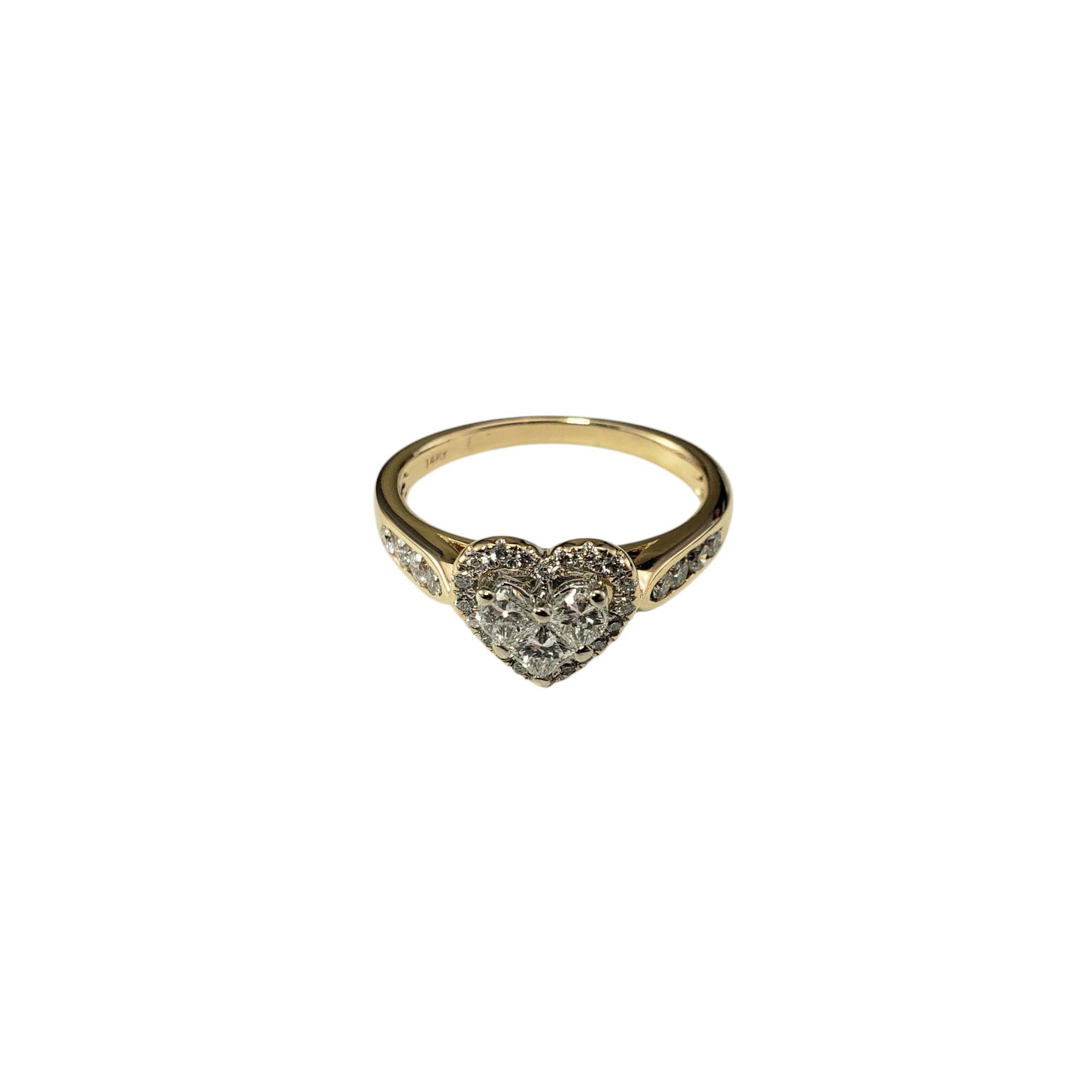 Bague en or jaune 14 carats et diamant en forme de coeur Taille 7

Cette bague de cœur étincelante est ornée d'un diamant de taille princesse, de 29 diamants ronds de taille brillante et d'un diamant rond de taille unique, le tout serti dans de l'or