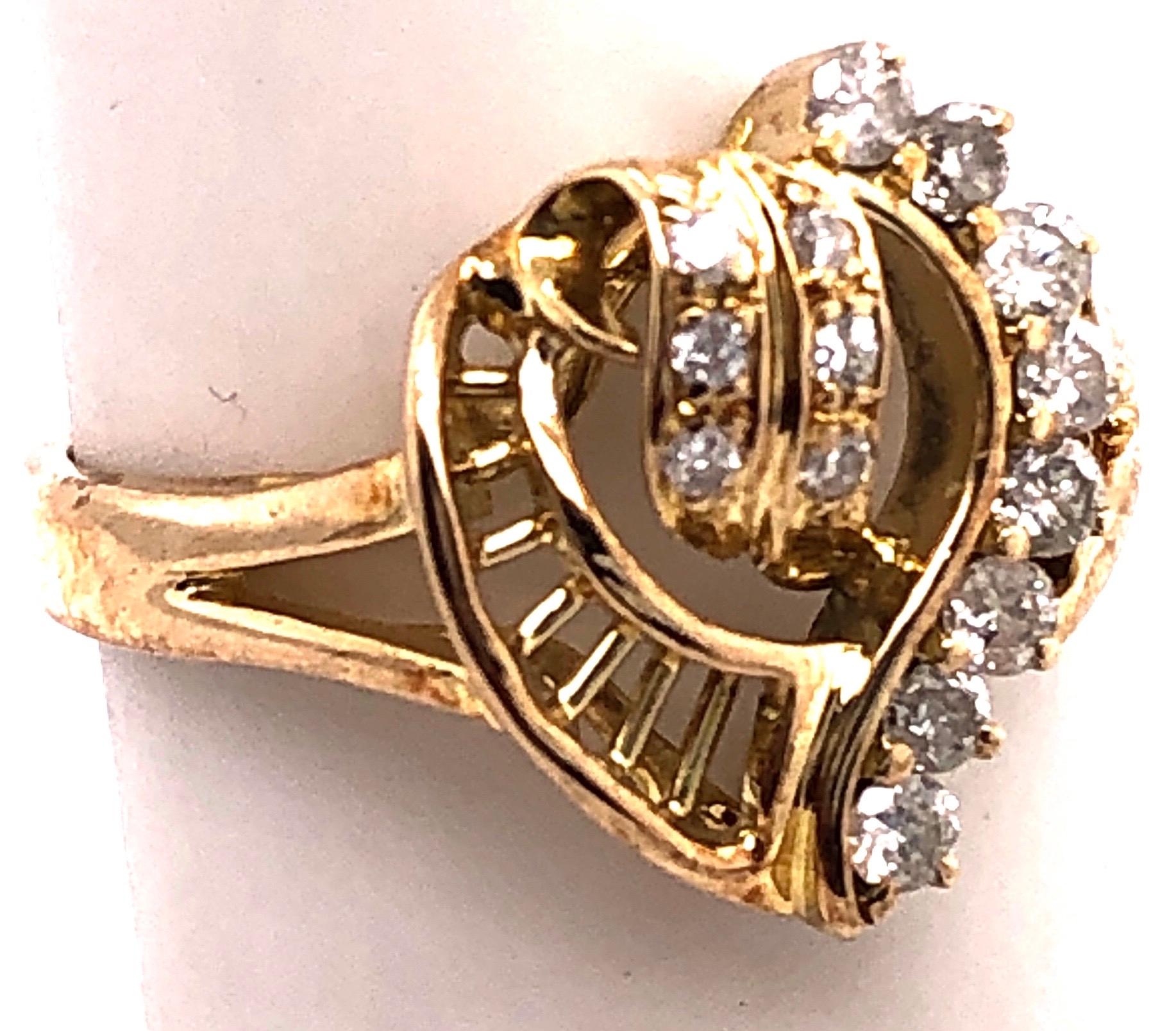 14 Karat Yellow Gold Fashion Ring/Heart with Round Diamonds.
0.75 total diamond weight.
Size 7
4 grams total weight.