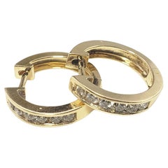 Pendientes de aro de oro amarillo de 14 quilates y diamantes