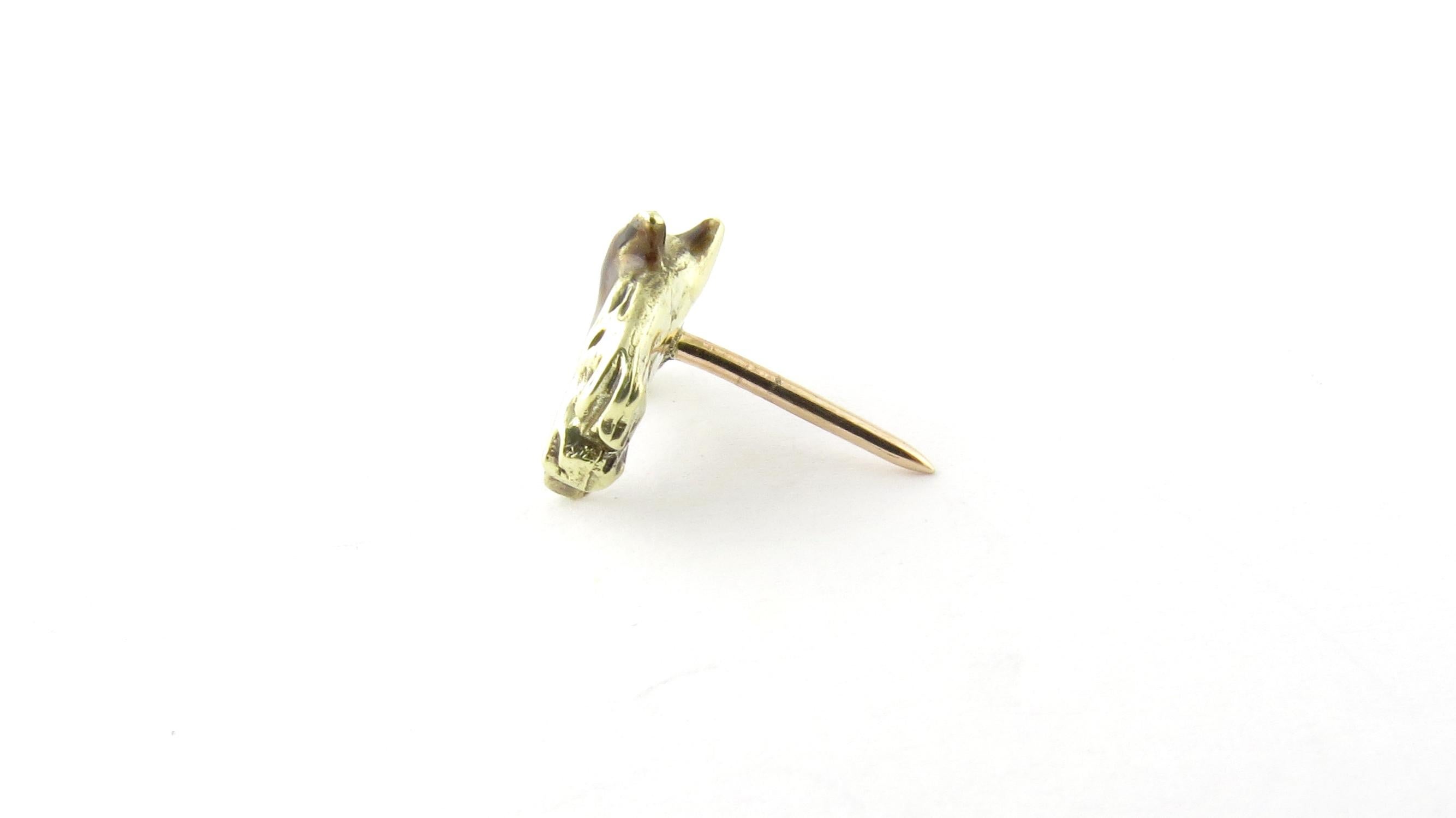Vintage 14 Karat Yellow Gold and Diamond Horse Head Tie Tack.

This lovely tie tack features a beautifully detailed enamel coated horse head accented with one round single-cut diamond. Crafted in elegant 14K yellow gold.

Approximate total diamond
