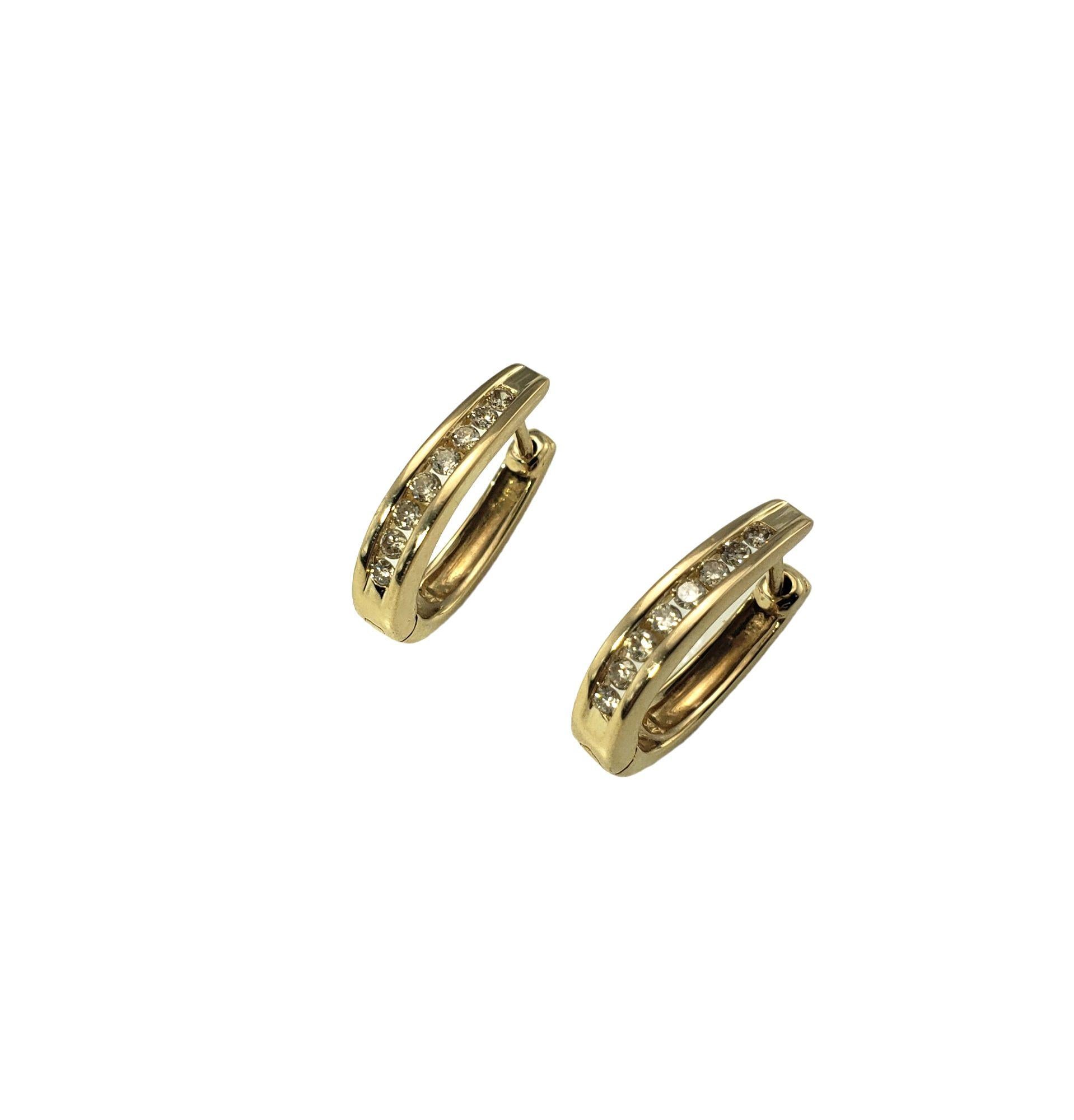 14 Karat Yellow Gold and Diamond Huggie Earrings 1