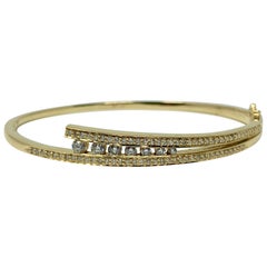 14 Karat Yellow Gold and Diamond Ladies Hinged Bangle Bracelet