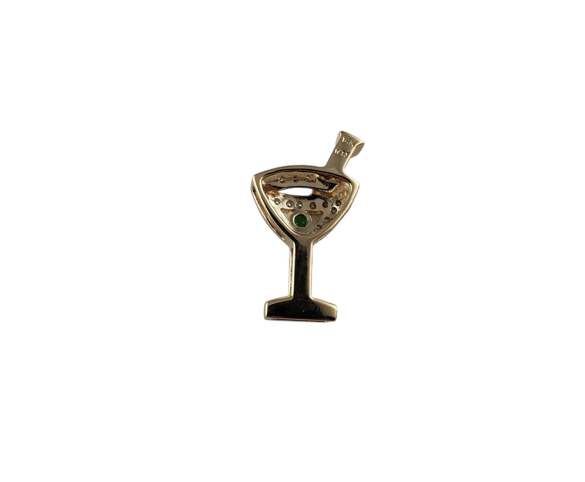 Vintage 14 Karat Yellow Gold and Diamond Martini Glass Charm-

Girl's night out!

This lovely martini glass charm features 33 round single cut diamonds and one green gemstone set in classic 14K yellow gold.

Approximate total diamond weight: .20