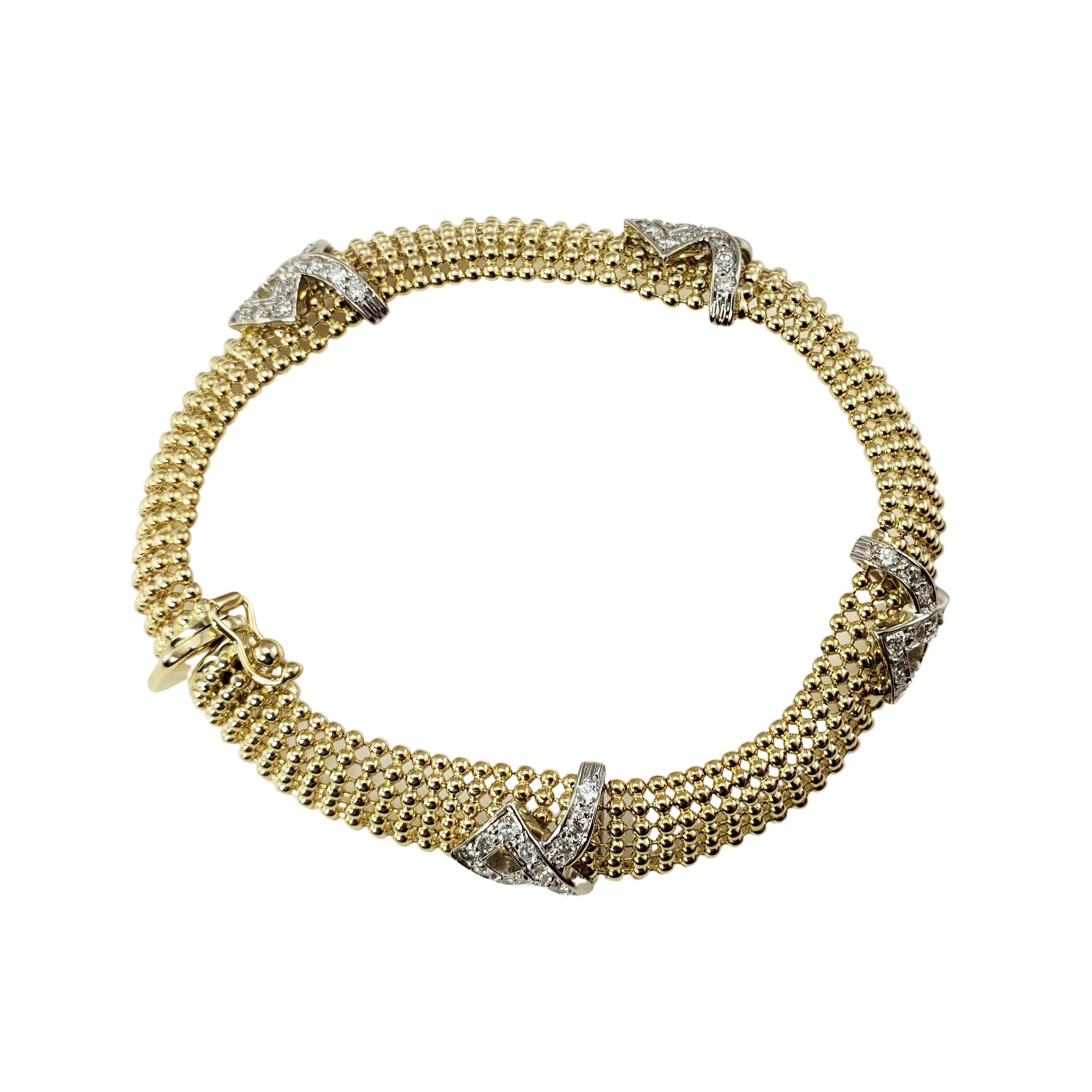 14 Karat Yellow Gold and Diamond Mesh Bracelet-

This stunning mesh bracelet features 56 round brilliant cut diamonds set in beautifully detailed 14K yellow gold.  Width:  12 mm.

Approximate total diamond weight: .96 ct.

Diamond color: