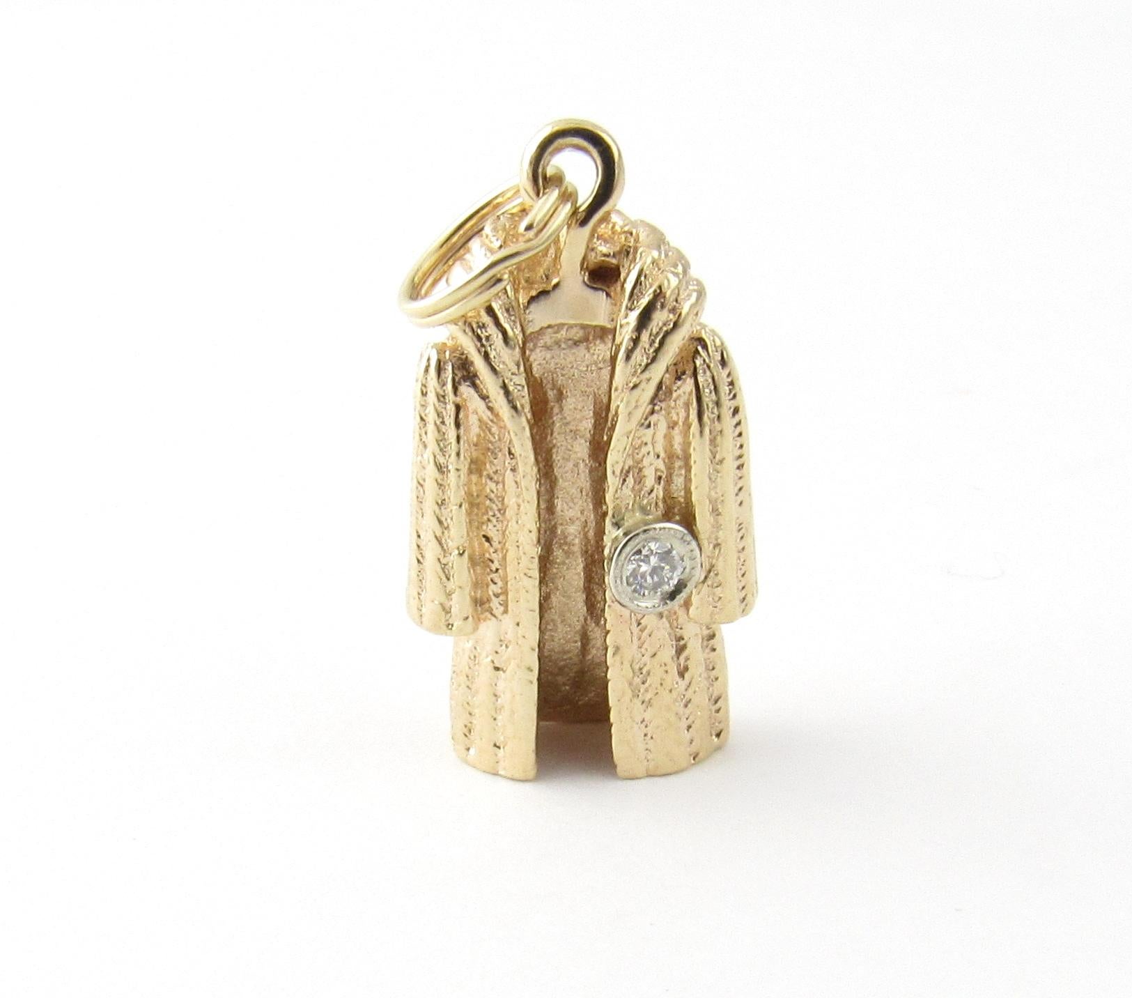 Vintage 14 Karat Yellow Gold and Diamond Mink Coat Charm

The ultimate luxury!

This lovely 3D charm features a miniature mink coat accented with one round brilliant cut diamond set in beautifully detailed 14K yellow gold.

Approximate total diamond