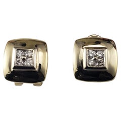 14 Karat Yellow Gold and Diamond Omega Back Earrings #20564