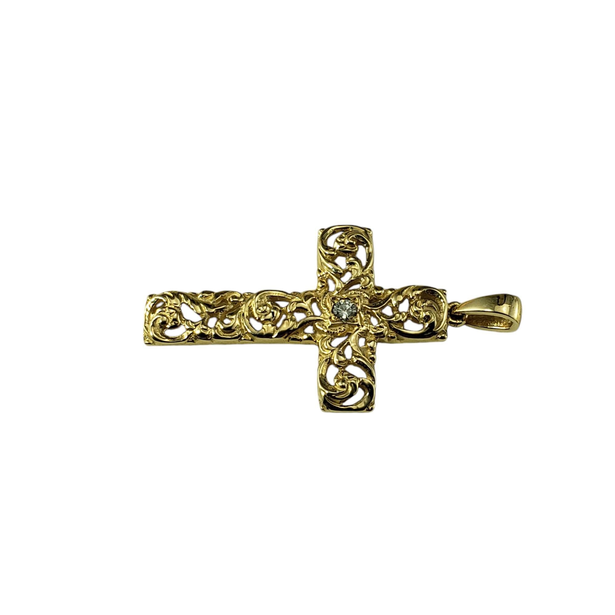 Pendentif en or jaune 14 carats et diamants en forme de croix à enroulement ouvert

Ce superbe pendentif en forme de croix est orné d'un diamant rond de taille brillant serti dans de l'or jaune 14 carats aux détails magnifiques.

Poids total