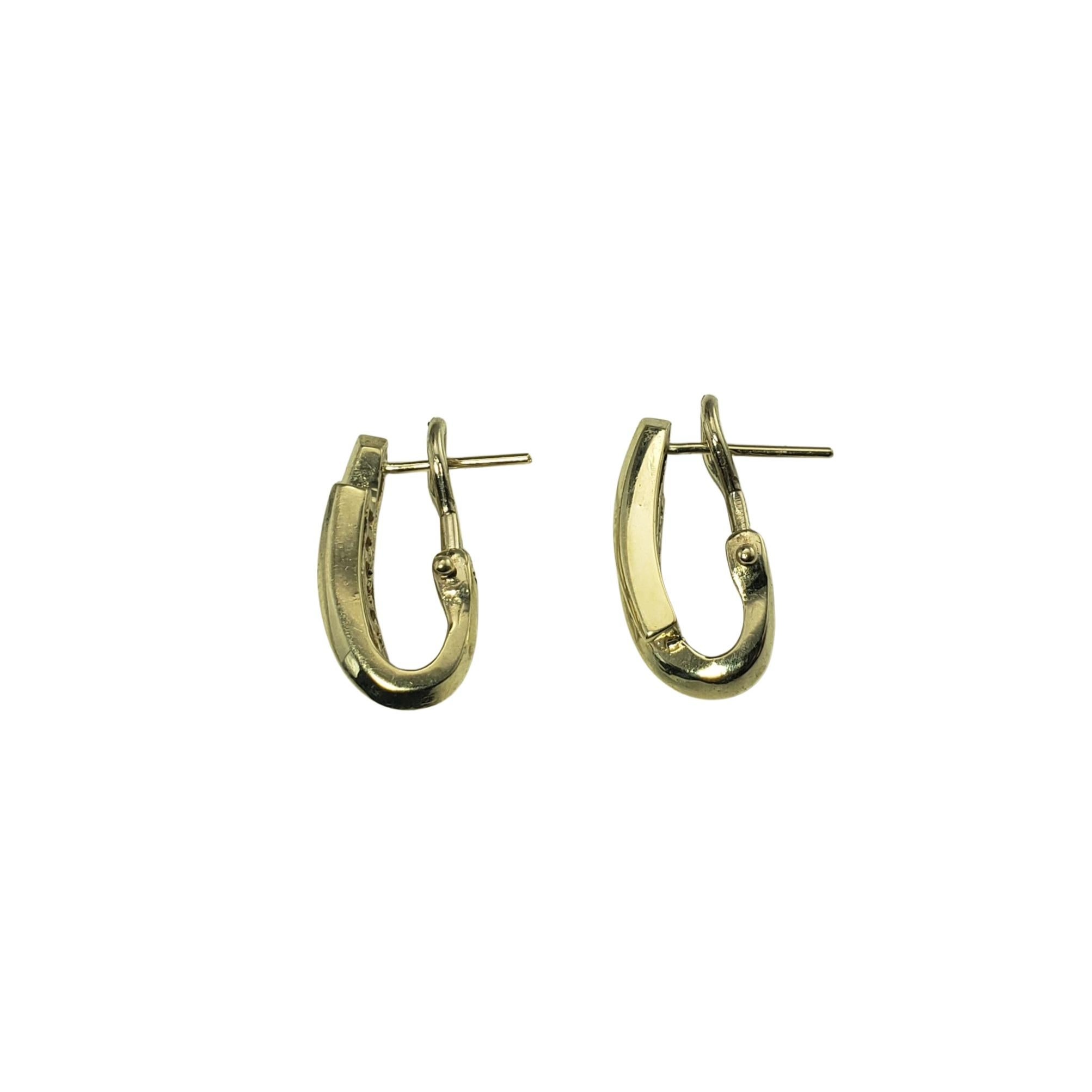 Women's 14 Karat Yellow Gold and Diamond Oval Hoop Earrings For Sale