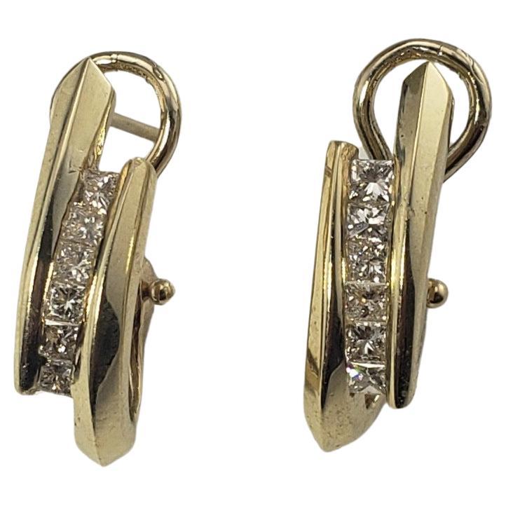 14 Karat Yellow Gold and Diamond Oval Hoop Earrings For Sale