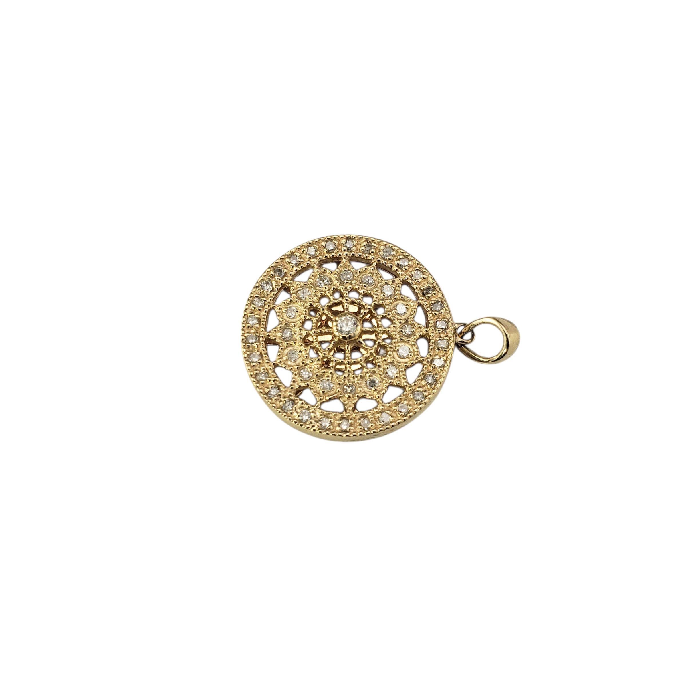 14 Karat Yellow Gold and Diamond Pendant-

Elevate your jewelry collection with this exquisite 14K gold pendant, featuring a stunning mandala-inspired design. Adorned with 47 round cut diamonds set in 14K yellow gold.

Approximate total diamond