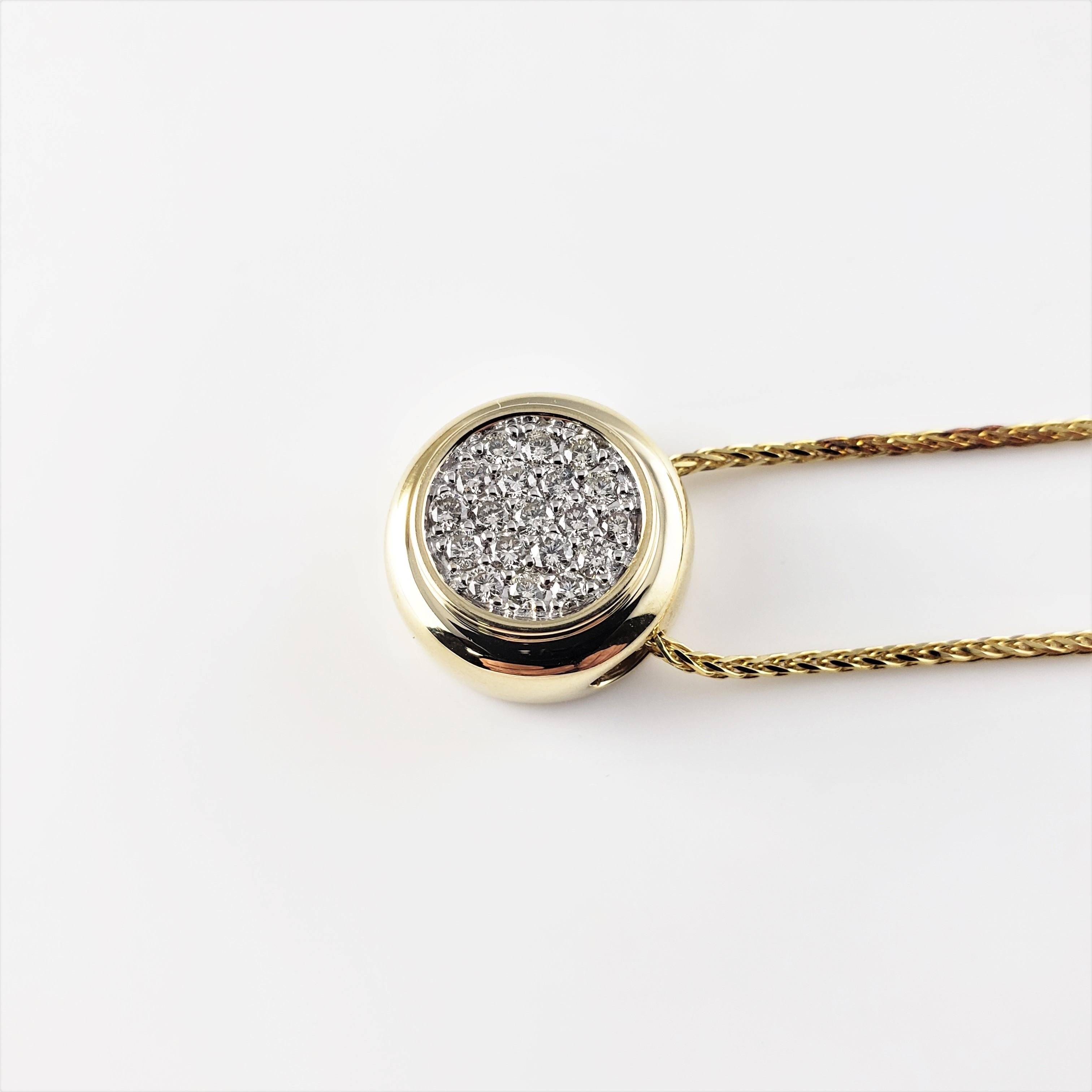 14 Karat Yellow Gold Diamond Pendant Necklace-

This sparkling slide pendant features 19 round brilliant cut diamonds set in classic 14K white gold. Elegant 14K yellow gold wheat chain included.

Approximate total diamond weight:  .50 ct.

Diamond