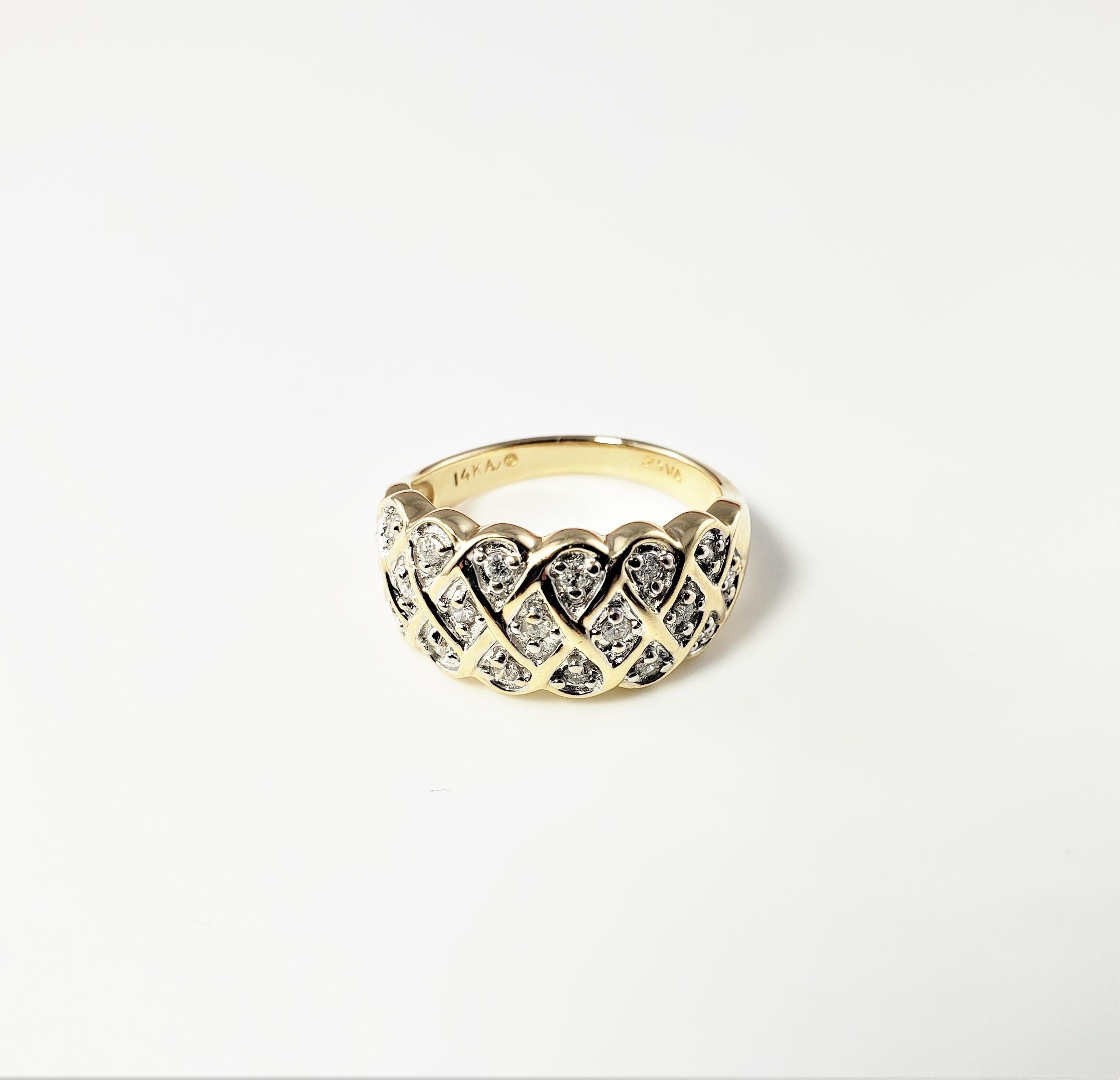 Vintage 14 Karat Yellow Gold and Diamond Ring Size 6.5-

This stunning ring features 19 round brilliant cut diamonds set in beautifully detailed 14K yellow gold.  Width:  10 mm.  Shank:  3 mm.

Approximate total diamond weight:  .19 ct.

Diamond