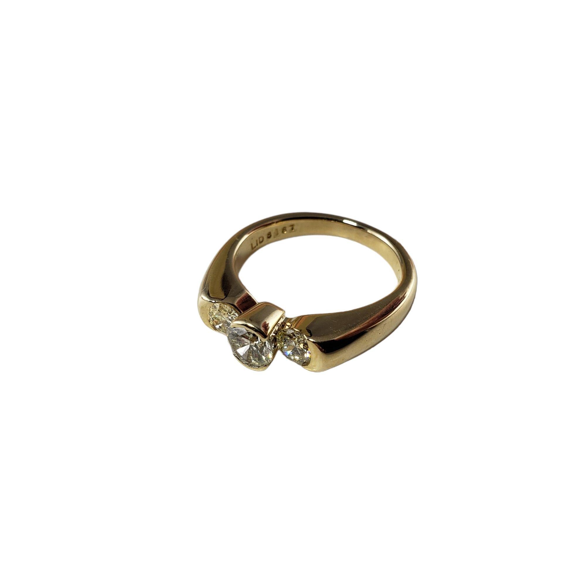 Vintage 14 Karat Yellow Gold and Diamond Ring Size 5.75 JAGi Certified-

This sparkling ring features three round brilliant cut diamonds set in classic 14K yellow gold. Width: 6 mm.
Shank: 2 mm.

Total diamond weight: .88 ct.

Diamond color: