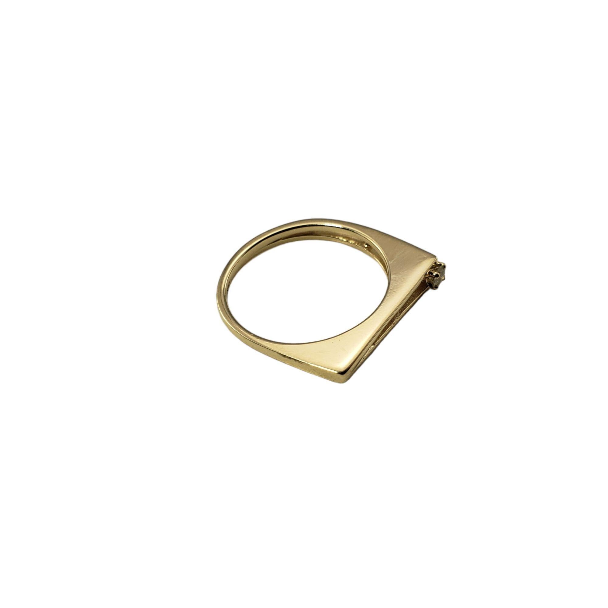 14 Karat Yellow Gold and Diamond Ring Size 5.75-

This elegant ring features one round brilliant cut diamond set in classic 14K yellow gold. Width: 3.3 mm.  
Shank: 1.7 mm. 

Approximate total diamond weight: .03 ct.

Diamond clarity: I1

Diamond