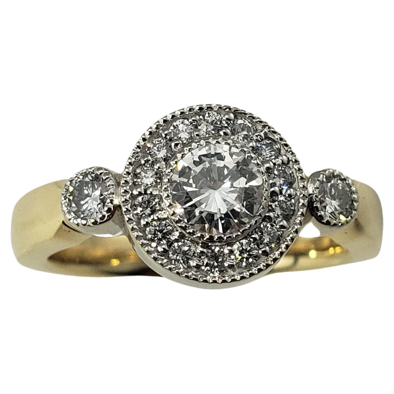 Ring aus 14 Karat Gelbgold mit Diamanten