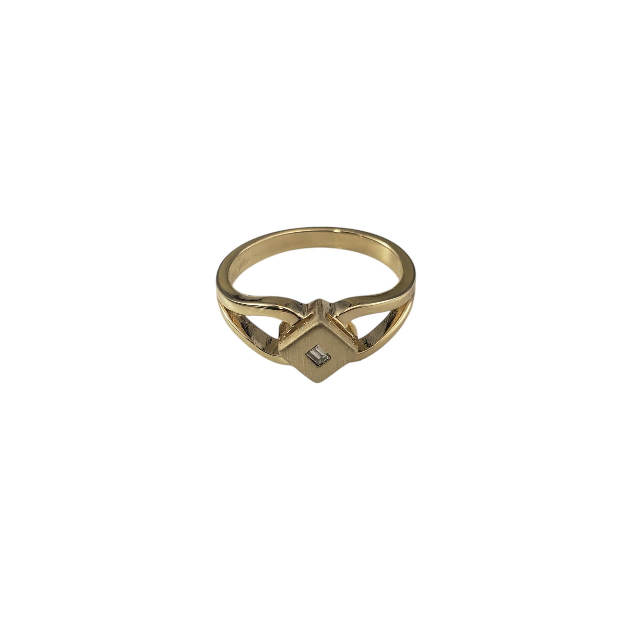 14 Karat Yellow Gold and Diamond Ring Size 6.25

This elegant ring features one baguette cut diamond set in brushed 14K yellow gold on a double shank band, adding depth and dimension to the design.

Width: 7 mm.
Shank: 2 mm.

Approximate total