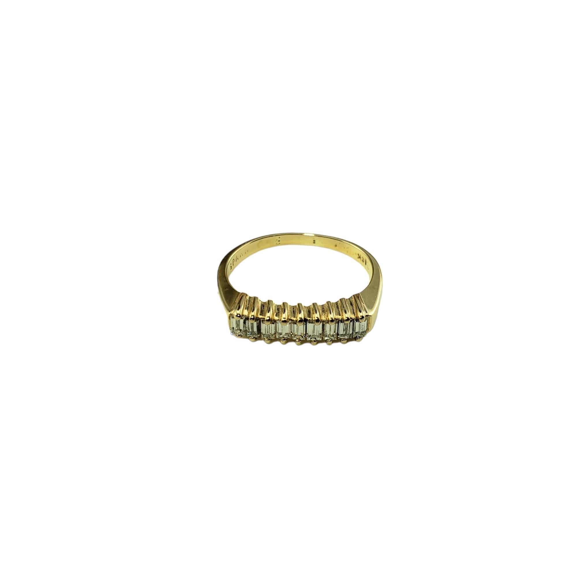 Vintage 14 Karat Yellow Gold and Diamond Ring Size 6.5-

This sparkling ring features nine baguette diamonds set in classic 14K yellow gold.  

Width:  4 mm.  Shank: 1.5 mm.

Approximate total diamond weight:  .20 ct.

Diamond color: G

Diamond