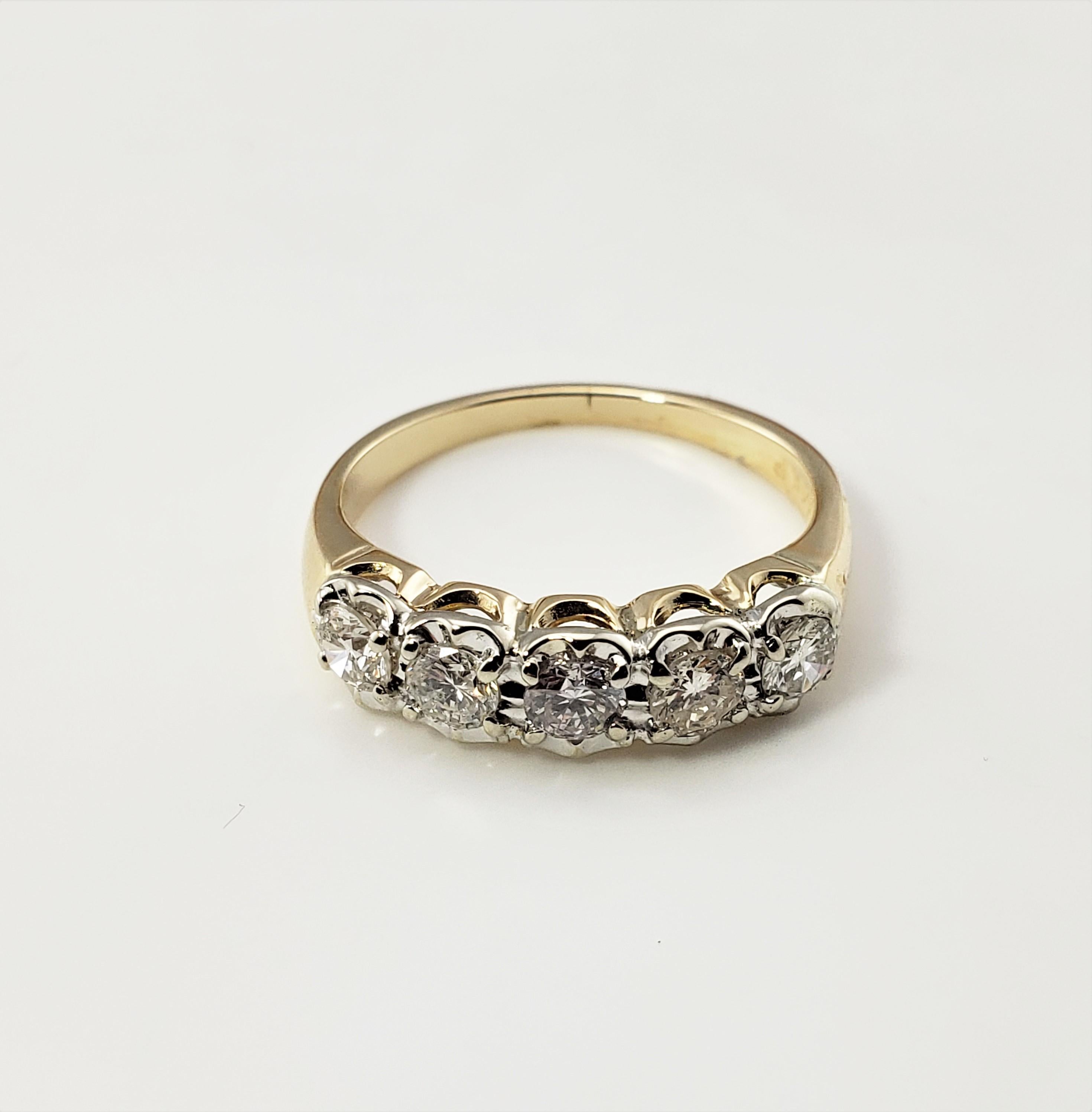 14 Karat Yellow Gold and Diamond Ring Size 6.5-

This sparkling ring features four round brilliant cut diamonds set in classic 14K white and yellow gold.  (Diamonds set in white gold; band is yellow gold)
Width:  5 mm.  Shank: 1 mm.

Approximate